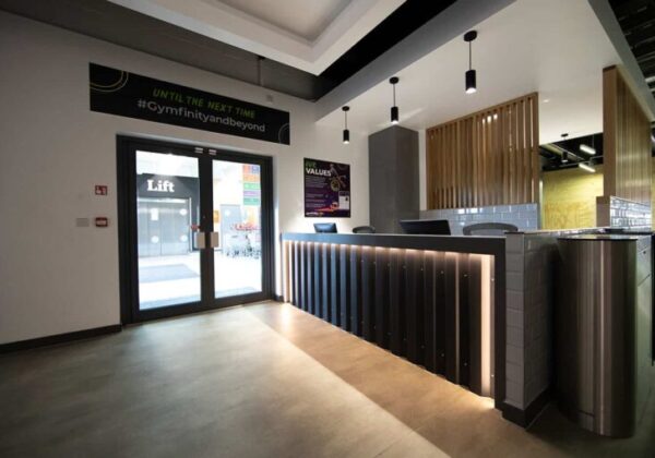Gymfinity-reception-fitout A bright airy reception desk in a building after gym re-fit