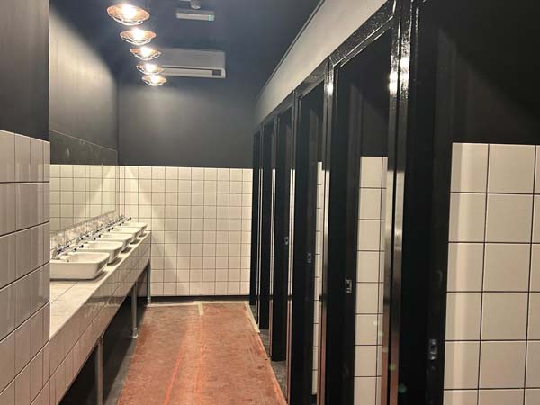 classic-building-group-refitted facilities Newly refurbished toilet facilities, finished in high gloss black paint and white crisp tiling